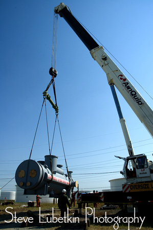 Perry Products 115,000-pound heat exchanger is lifted off flatbed at refinery